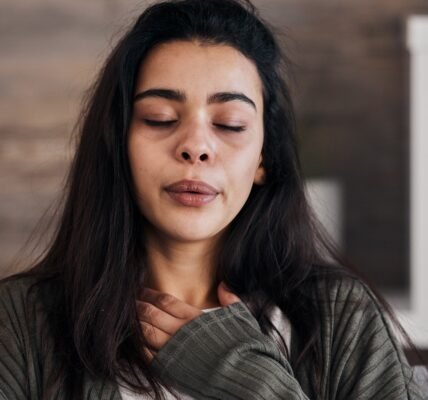 What It Means If You Feel A Lump In Your Throat Before Crying - Health Digest